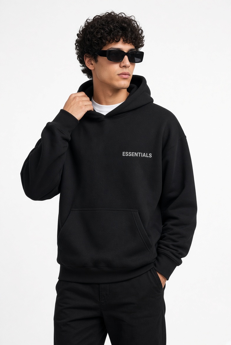 Man in black streetwear on a night street